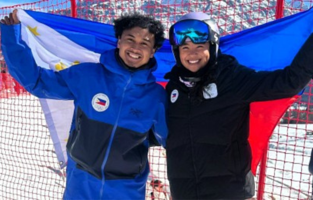 WINTER OLYMPICS. Francis Ceccarelli and Tallulah Proulx holding the Philippine flag at the 25th Winter Olympics on Wednesday (Feb. 18, 2026). They will attend the closing ceremony on Feb. 22 at Verona Arena in Verona, Italy. (Contributed photo)