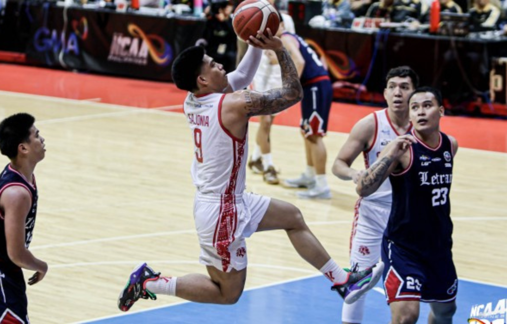 FINALS DUEL. Bryan Sajonia of San Beda University goes for the basket against Letran in Game 1 of the NCAA Season 101 men's basketball best-of-three title series at the Smart Araneta Coliseum on Wednesday (Dec. 10, 2025). The Red Lions won, 89-70, moving a game closer to winning the championship. (NCAA photo)