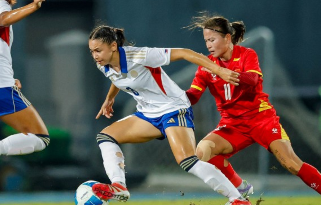 CHAMPIONS. Filipino-Norwegian Sara Eggesvik (left) controls the ball during the game against Vietnam in the SEA Games women's football final on Wednesday (Dec. 17, 2025) night at the Chonburi Daikin Stadium in Thailand. The Philippines won, 6-5, to secure the gold medal. (POC Media Pool photo)