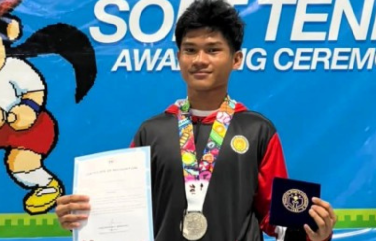 TWIN VICTORY. Frank Nhiele Dilao of City of Santa Rosa, Laguna shows his soft tennis silver medal at the General Santos City Batang Pinoy National Championships in October 2025. He and his twin brother, France Vhiele, made it to the boys' U18 quarterfinals of MAC’s Crank It junior tennis tournament at Olivarez Sports Center in Paranaque City on Sunday (Dec. 28). (Contributed photo)
